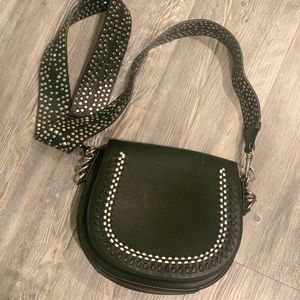 Cross body black guitar strap bag